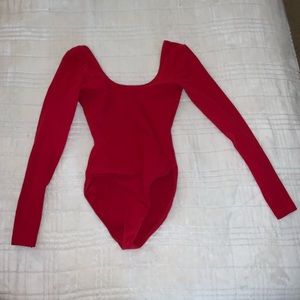 Red body suit, low back